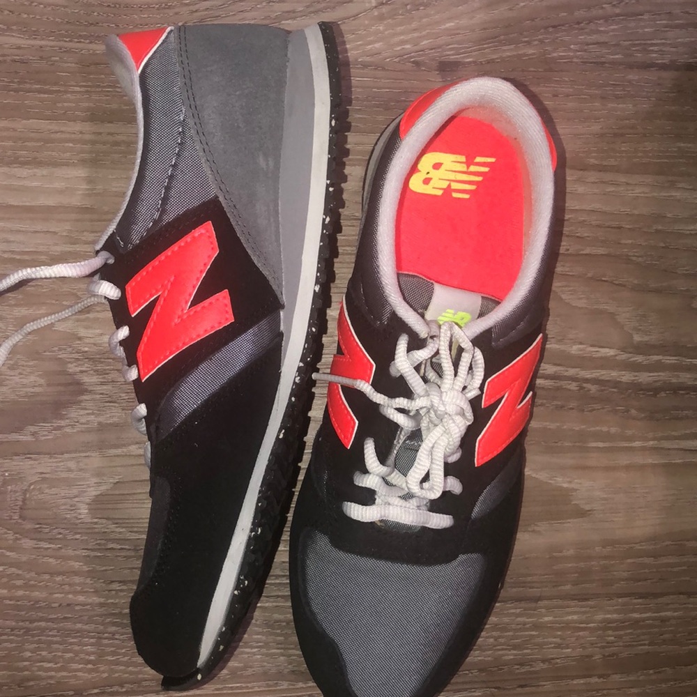 Black and orange new balance sneakers